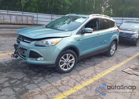 2013 Ford Escape Titanium z USA, uszkodzony, nr VIN 1FMCU9J99DUD63037